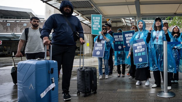 Travellers in limbo as WestJet flight attendants go on strike