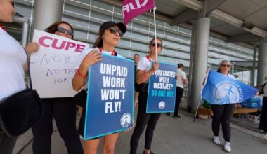 ‘We’re a volleyball’: Travellers in Winnipeg stranded as WestJet flight attendants strike kicks off