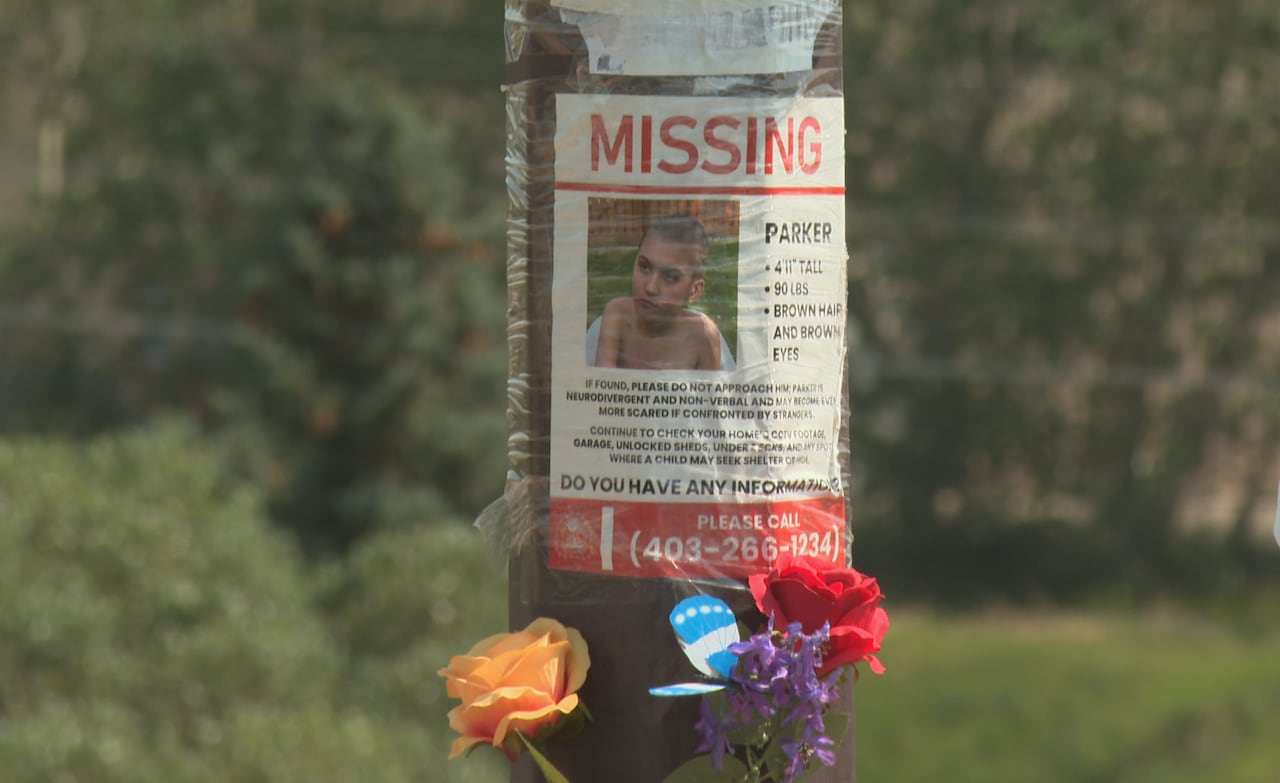 A missing poster on a boy for a boy named Parker