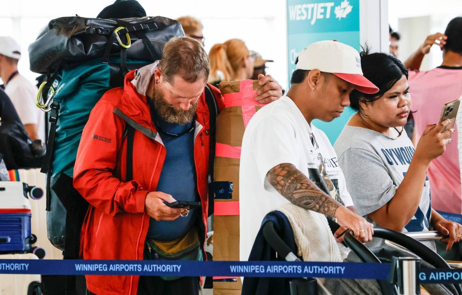 Travellers in Winnipeg scramble to rebook flights as WestJet attendants reach tentative deal – Winnipeg Free Press
