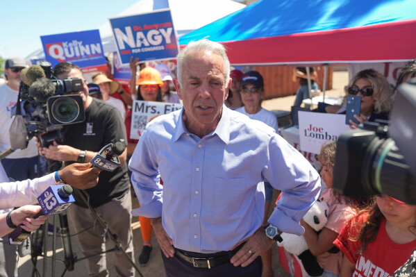 Nevada Gov. Joe Lombardo talks to reporters outside a vote center June 9, 2026, in Las Vegas. (AP Photo/Jae C. Hong, File)