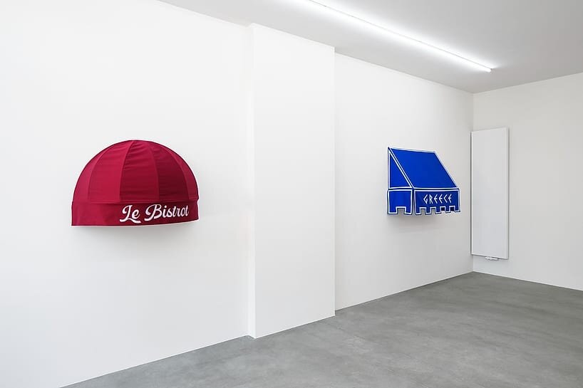storefront canopies leave the streets behind to become sculptures of urban identity - 4