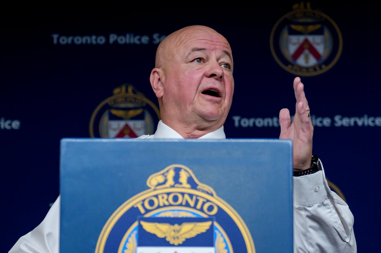 A man speaking at a podium.