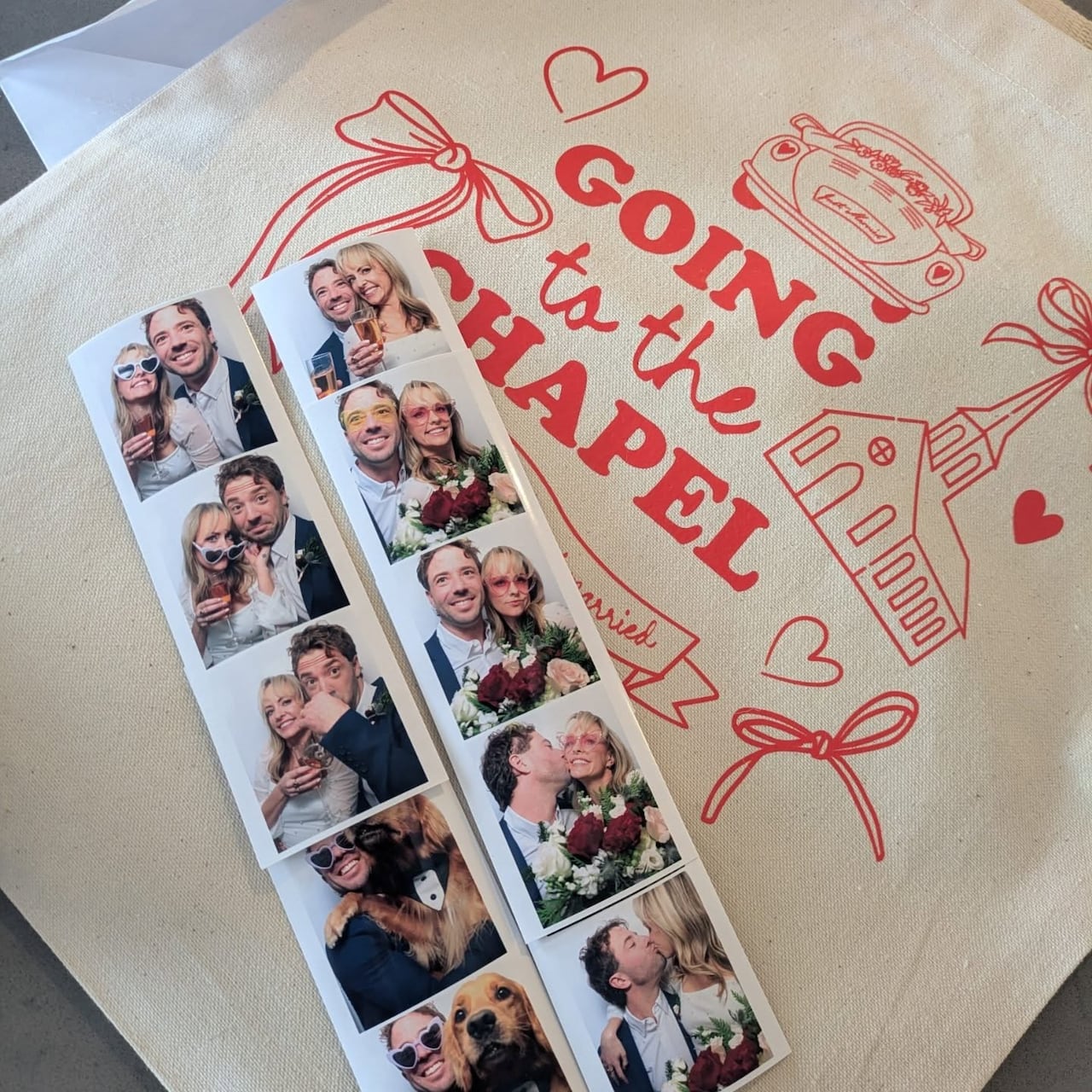 Photo booth images of a bride and groom on top of a poster that says 'going to the chapel.'
