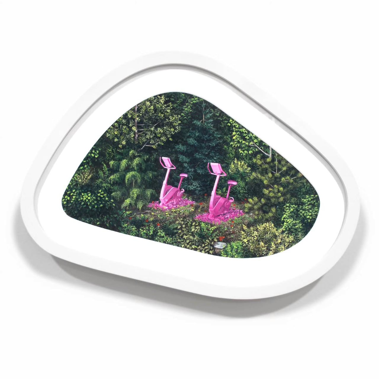 Surreal landscape in a white ovoid frame. Two magenta stationary bikes appear illuminated, resting side by side in a lush green area.