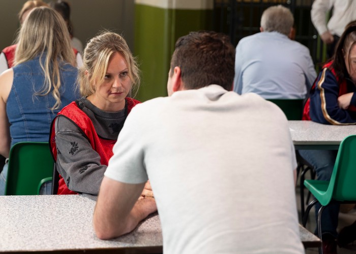 10_08_coro_sarah_kit_02 Sarah talks to Kit in prison in a scene from Coronation Street