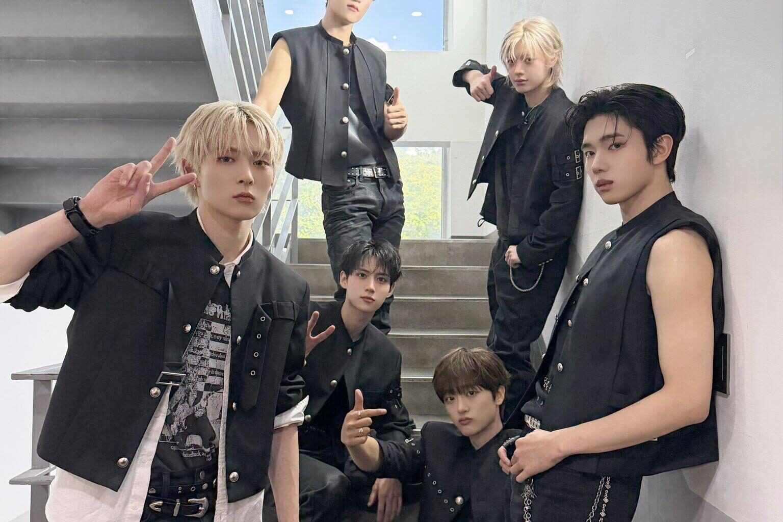 Members of K-pop boy band LUN8 pose before the band