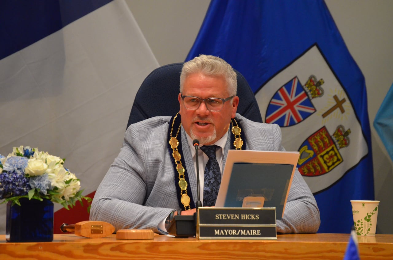 Fredericton Mayor Steve Hicks sits at the mayor's chair.