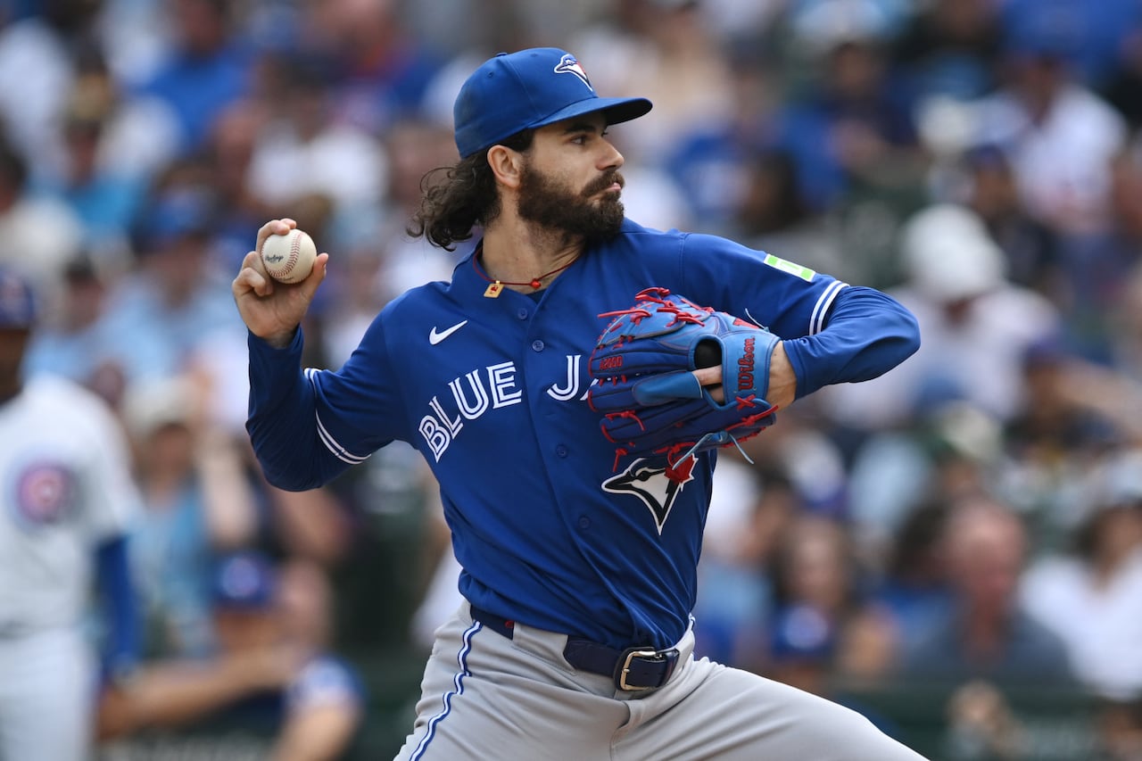 Blue Jays starting pitcher Dylan Cease delivers a pitch from the mound during an Aug. 6, 2026 game against the Chicago Cubs.