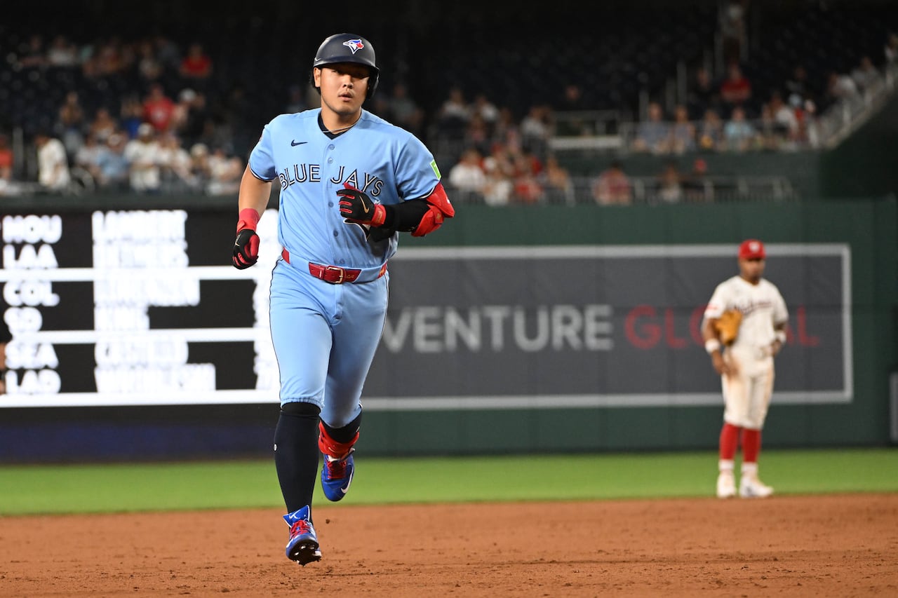 Blue Jays slugger Kazuma Okamoto rounds the bases during a home-run trot in at Nationals Park in Washington, D.C.