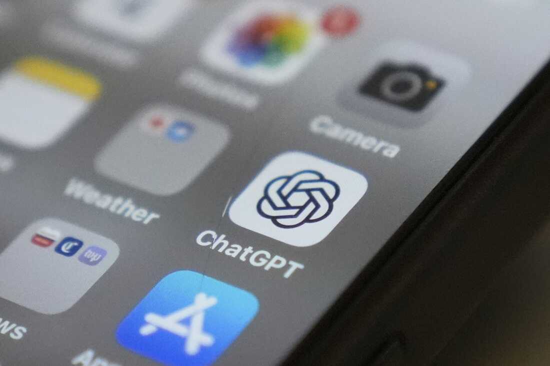 The ChatGPT app icon is seen on a smartphone screen, among other app icons.