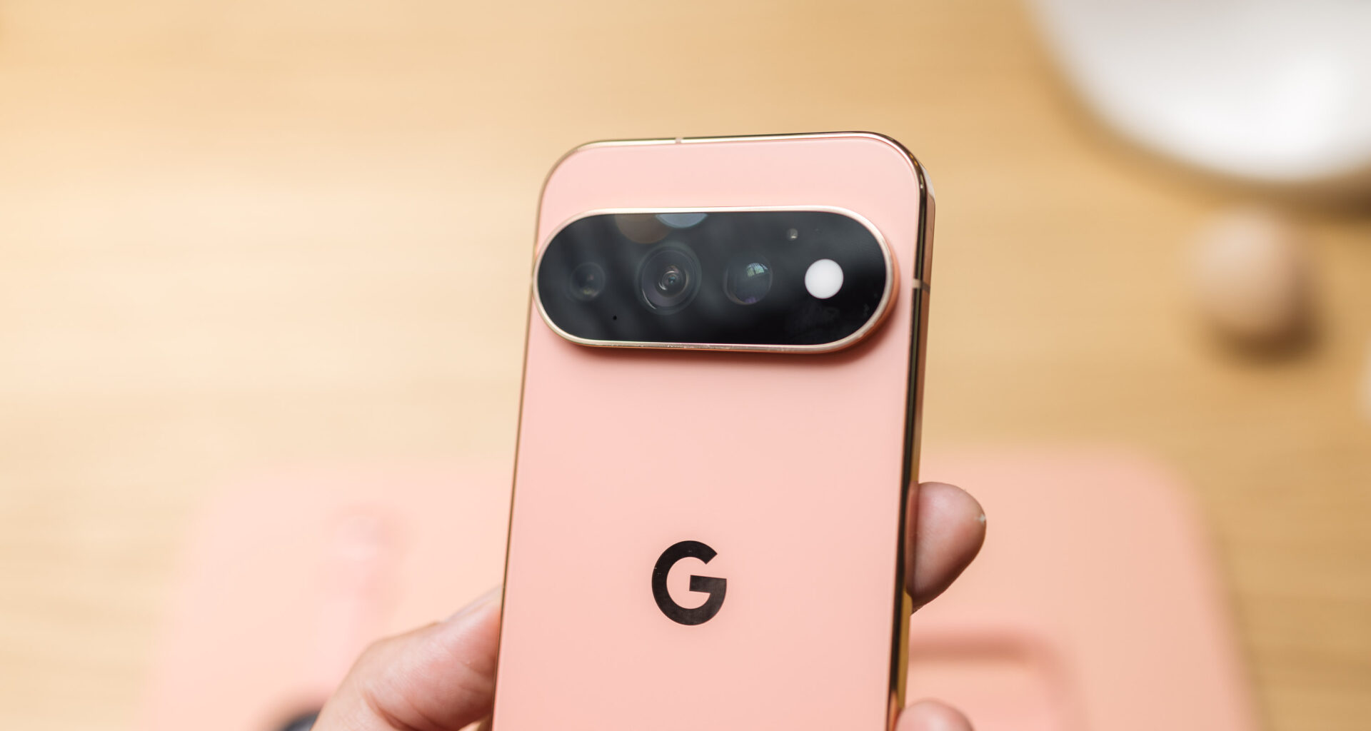 A hand holds a Google phone