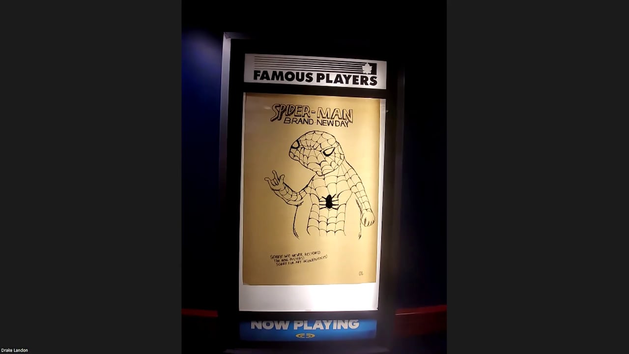 A hand drawn poster for the film Spider-Man: Brand New Day is displayed in a Famous Players frame.