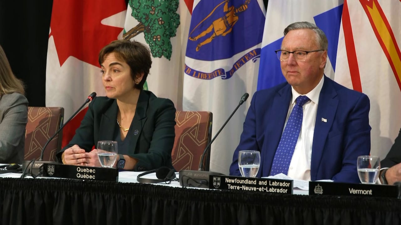 A man and woman seated at a table.