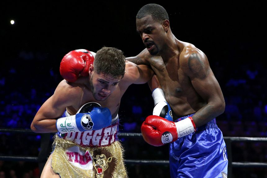 Prichard Colón is punched by Terrel Williams during their super welterweight bout at EagleBank Arena.
