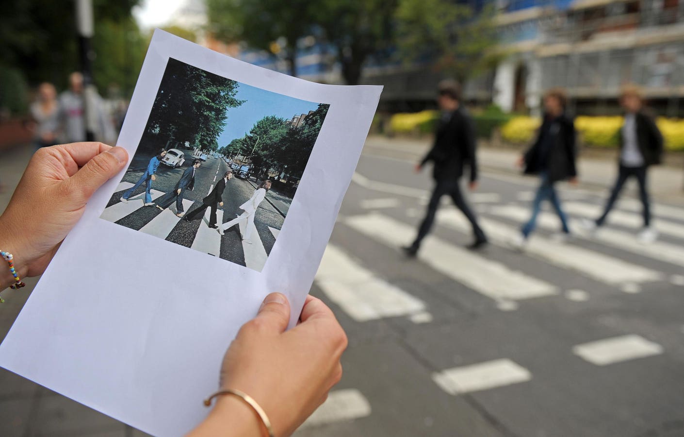 Video Captures ‘Abbey Road’ Crosswalk Scene During Filming Of Beatles Biopics