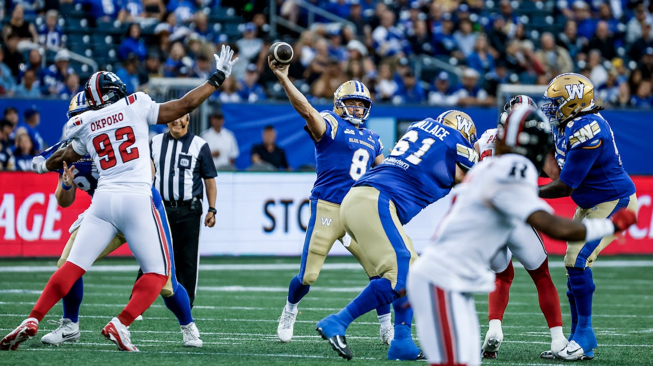 An image of a quarterback throwing the ball in an active football game.