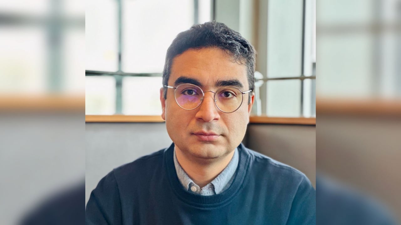 A professional photograph of a man.