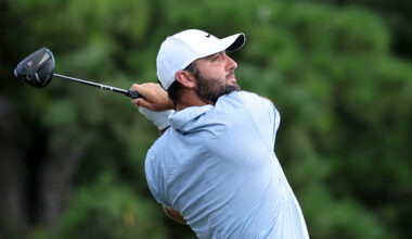 Golfer Scottie Scheffler swinging a club.