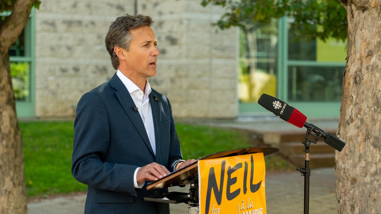 A man at a lectern