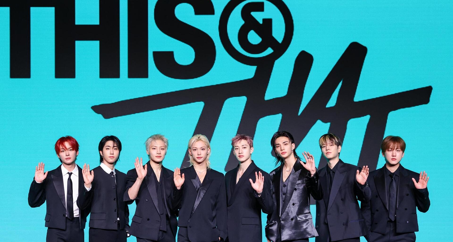 Members of K-pop boy band Stray Kids pose during a press conference for the release of the group