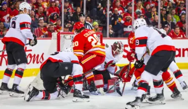 Ottawa Senators goaltender Kevin Mandolese (70) makes a save against the Calgary Flames during the second period at Scotiabank Saddledome.