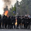 Youths gather in front of a burning barricade on Duncairn Gardens on June 9 in Belfast, Northern Ireland. 