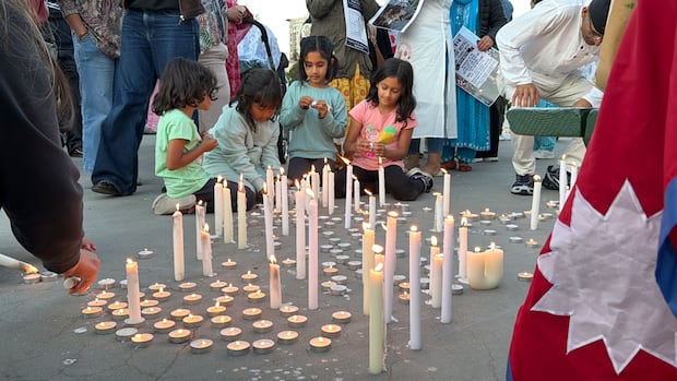 Ottawa's Nepalese community mourns flood victims at vigil