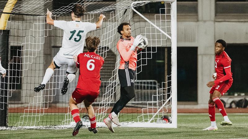 Redbirds corner the chances, Carabins claim the points in men's soccer season opener