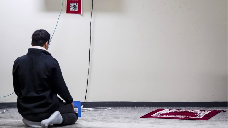 Muslim person praying