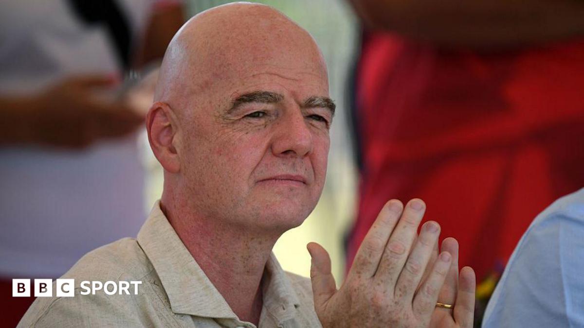 Gianni Infantino applauds during a ceremony in Colombia