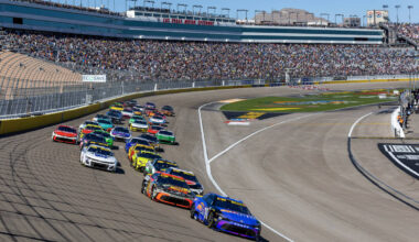 Denny Hamlin (11) leads Chase Briscoe (19) and the rest of the field out of turn one at the sta ...