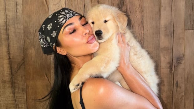 Kim Kardashian with puppy Halo.