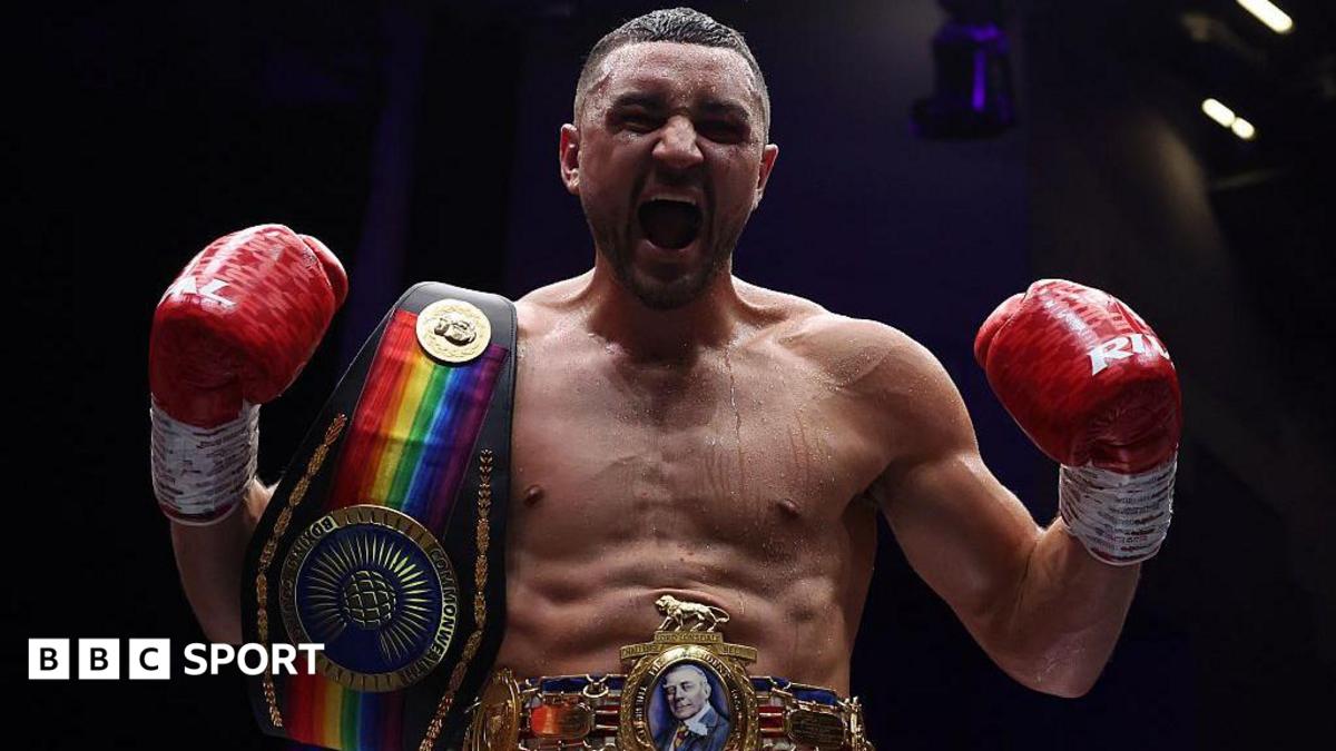 Callum Simpson celebrates with the British and Commonwealth super-middleweight belts after winning his rematch with Troy Williamson