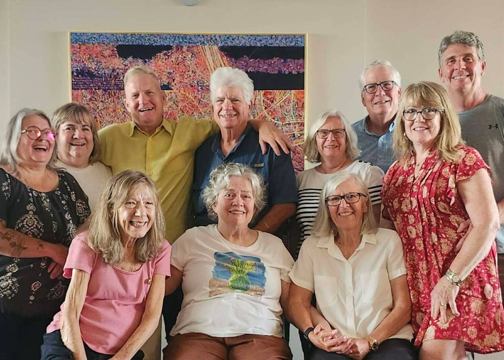 Submitted
Karen Busby (seated, centre) with wife Jan Lederman (centre right), her six siblings and their spouses at their final dinner before the trailblazing legal scholar died on July 23.