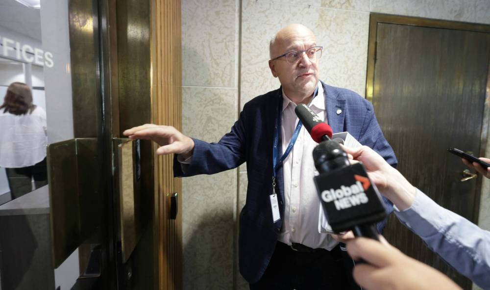 Ruth Bonneville/Winnipeg Free Press
Winnipeg Coun. Russ Wyatt walks into city hall on Thursday, Aug. 13.