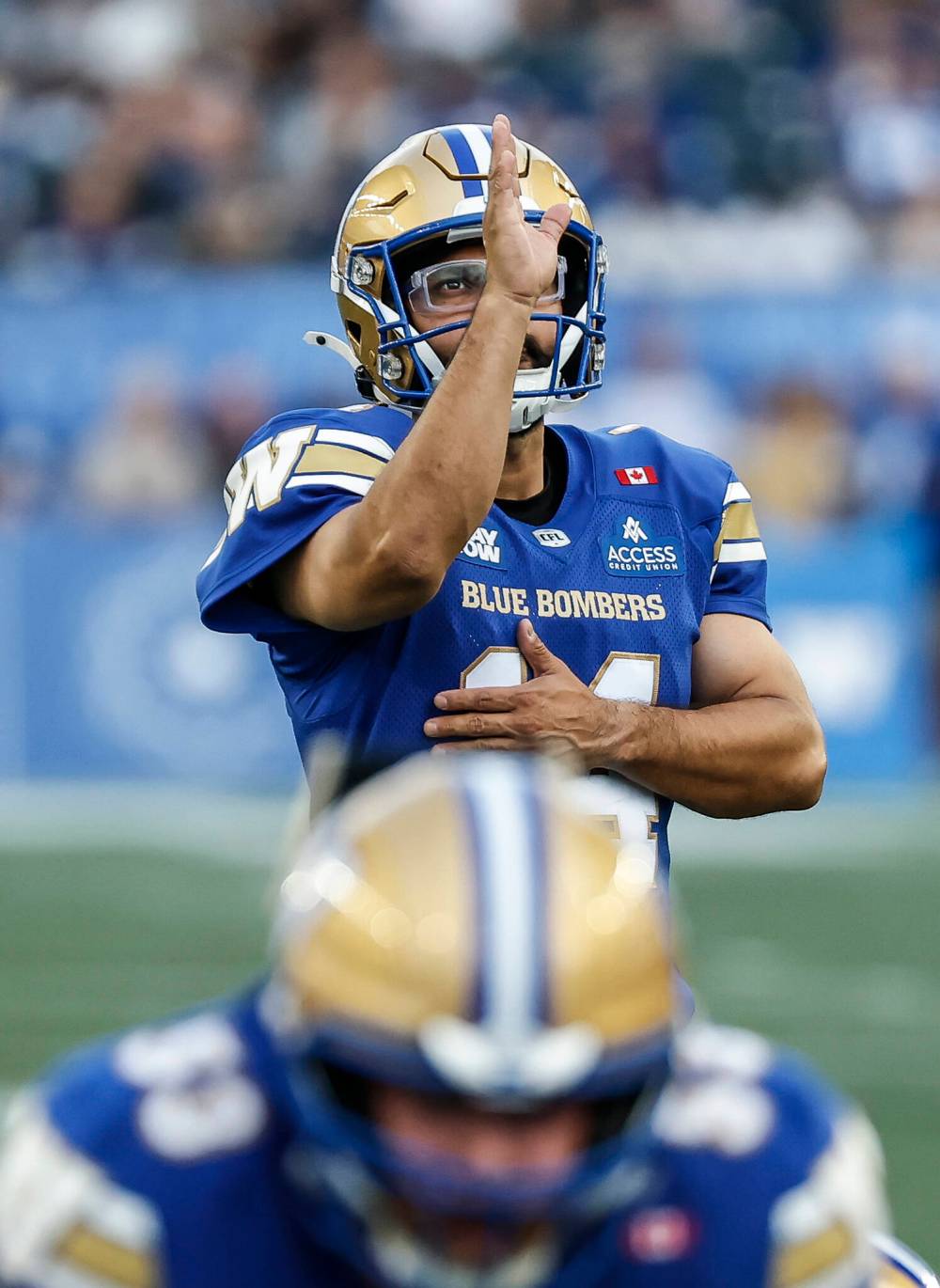 Winnipeg Blue Bombers kicker Sergio Castillo (14) lines up a field goal against the B.C. Lions during first half CFL football action in Winnipeg on Thursday, July 30, 2026. THE CANADIAN PRESS/John Woods