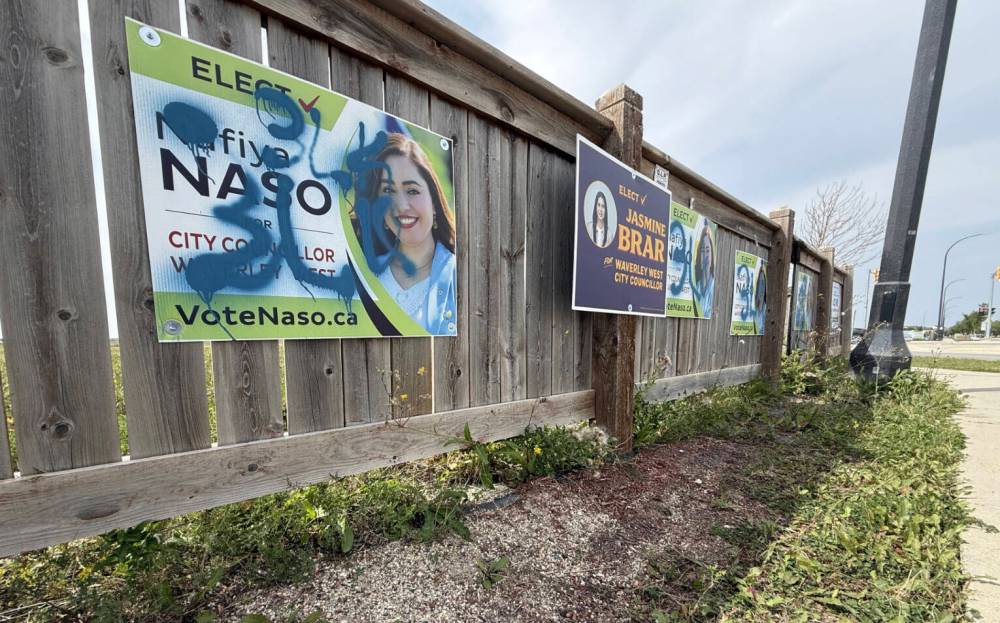 SCOTT BILLECK / FREE PRESS
Waverley West council candidate Nafiya Naso’s signs are seen covered with spray paint on Saturday.