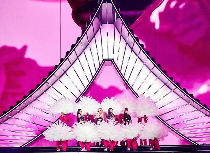Members of BLACKPINK perform during the Coachella Valley Music and Arts Festival in Indio, Calif., in April 2023. The group incorporated traditional Korean architectural motifs into its stage production. Courtesy of YG Entertainment