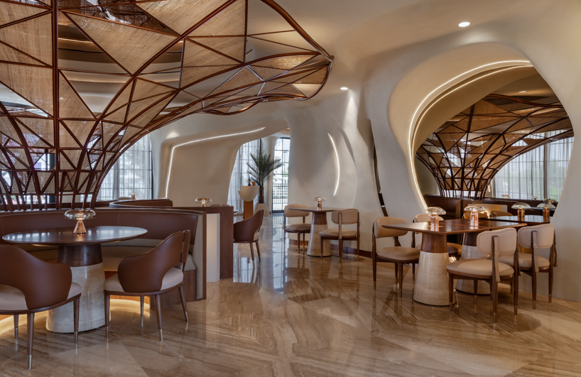 falwa restaurant transforms arabian equestrian heritage into fluid architectural interior - 3