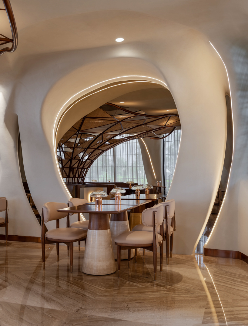 falwa restaurant transforms arabian equestrian heritage into fluid architectural interior - 7