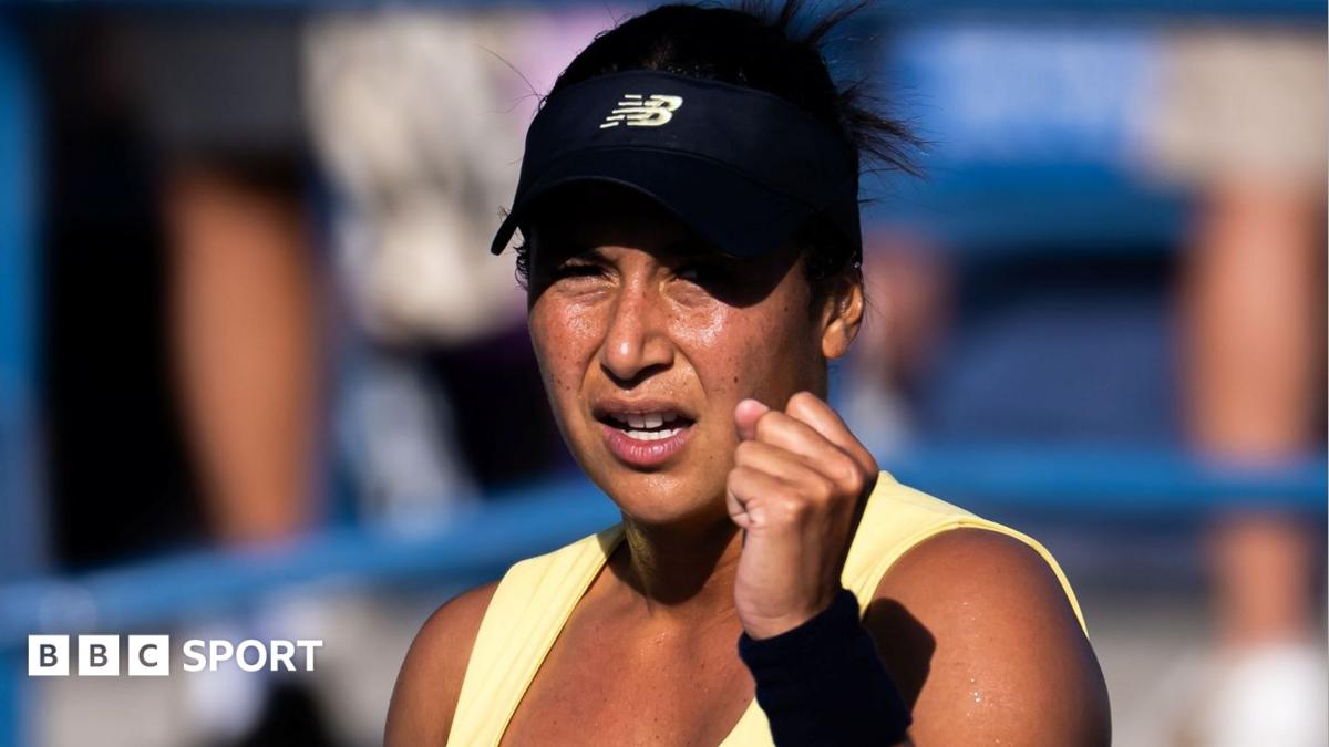 Heather Watson clenches her fist in celebration after winning a point in US Open qualifying