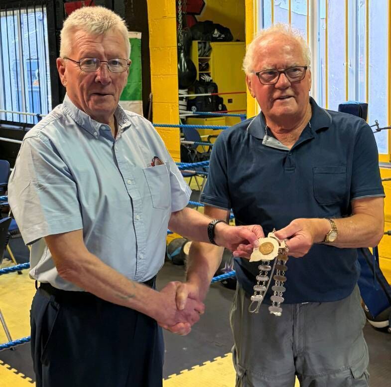 Incoming President Cork Ex-Boxers Association Dan O'Connell receives the chain of office from outgoing President Derry McCarthy MOB 