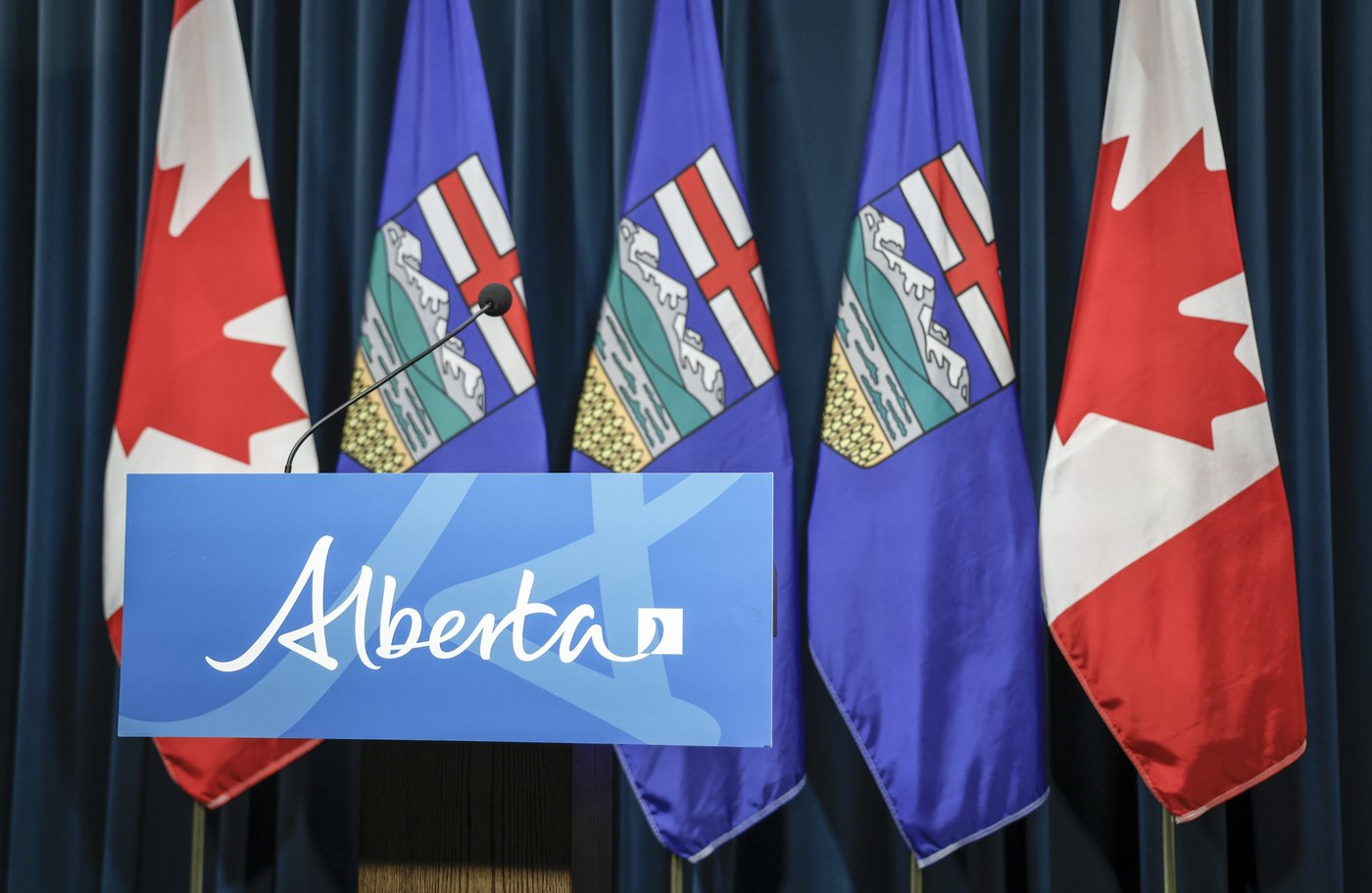 Duelling symbols: Alberta and Canada flags creating division ahead of referendum