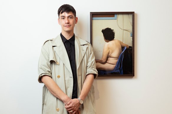 Nathan Beard with his winning work at Canberra’s National Portrait Gallery.