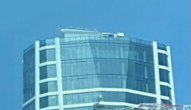 Crane Coming Down As Glass Parapet Ends Pinnacle SkyTower Cladding