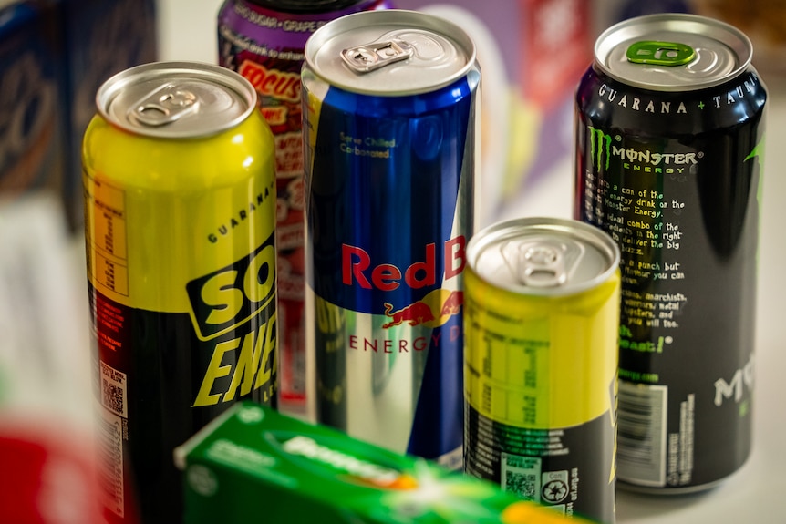 A number of cans of energy drinks.