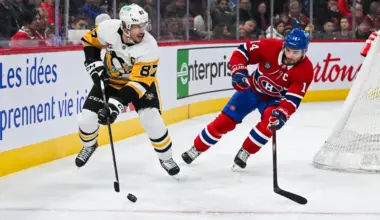 Pittsburgh Penguins center Sidney Crosby (87) plays the puck against Montreal Canadiens center Nick Suzuki (14) during the third period at Bell Centre.