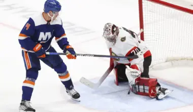 Ottawa Senators goaltender Kevin Mandolese (70) makes a save against New York Islanders center Bo Horvat (14) during overtime at UBS Arena.