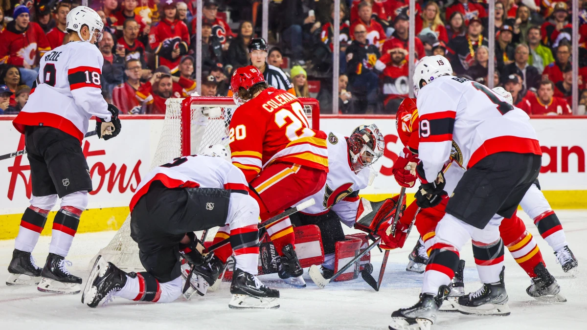 Ottawa Senators goaltender Kevin Mandolese (70) makes a save against the Calgary Flames during the second period at Scotiabank Saddledome.